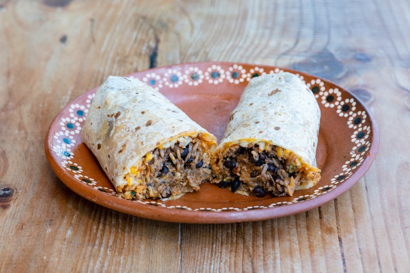 Cafe Rio Classic Chicken Burrito with fresh salsa and cilantro rice